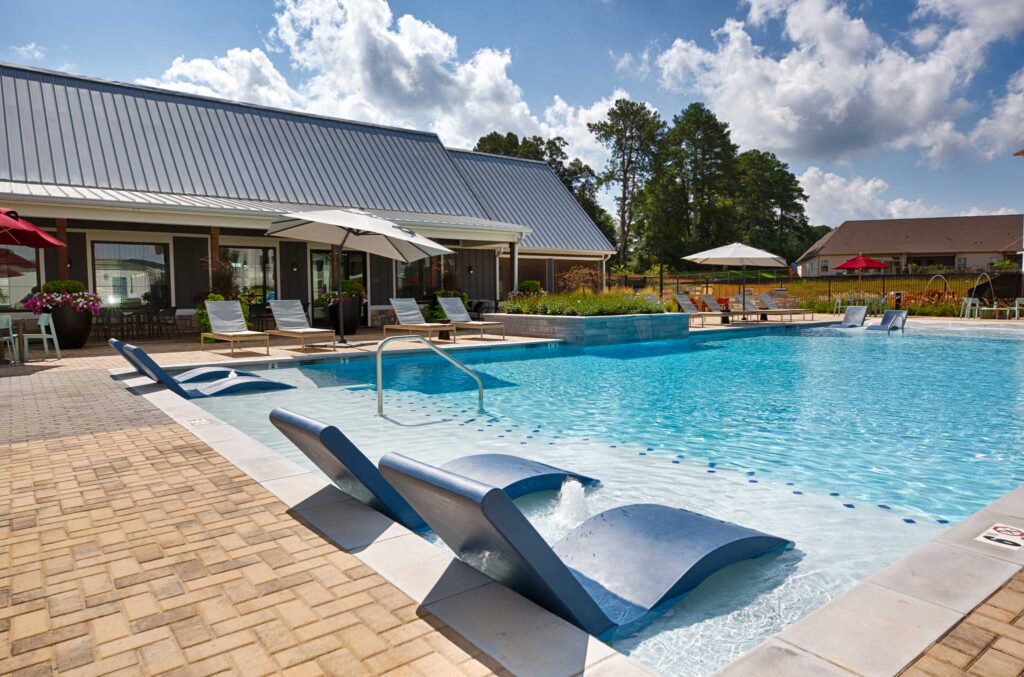 Poolside view of FarmHaus Apartments
