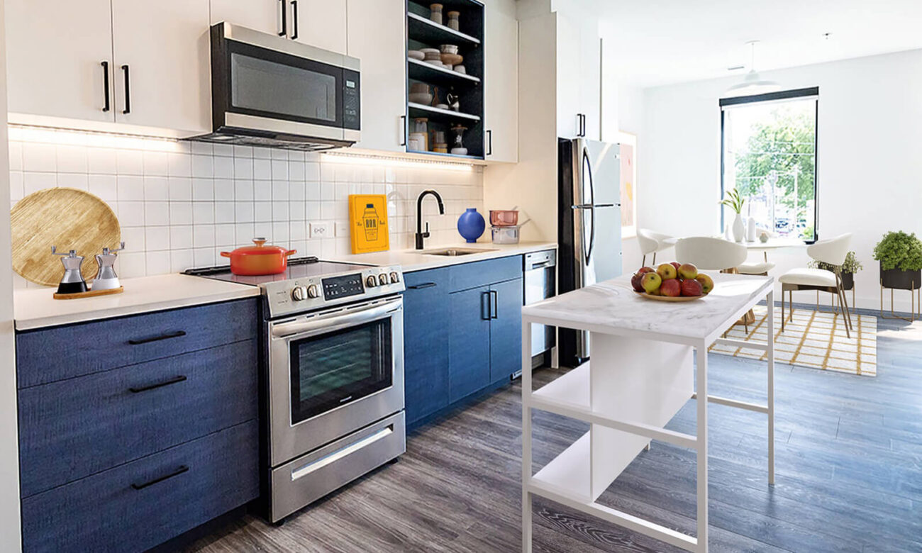 Kitchen in apartment at VIV with lots of natural lighting shining in.