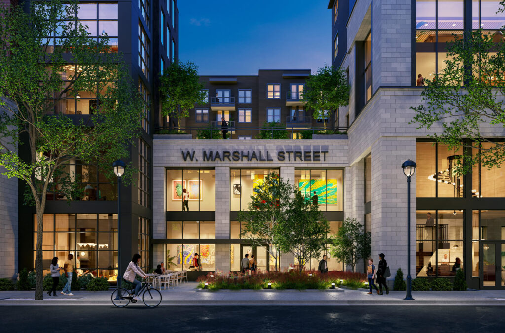 The front of West Marshall with people walking by and walking through the building