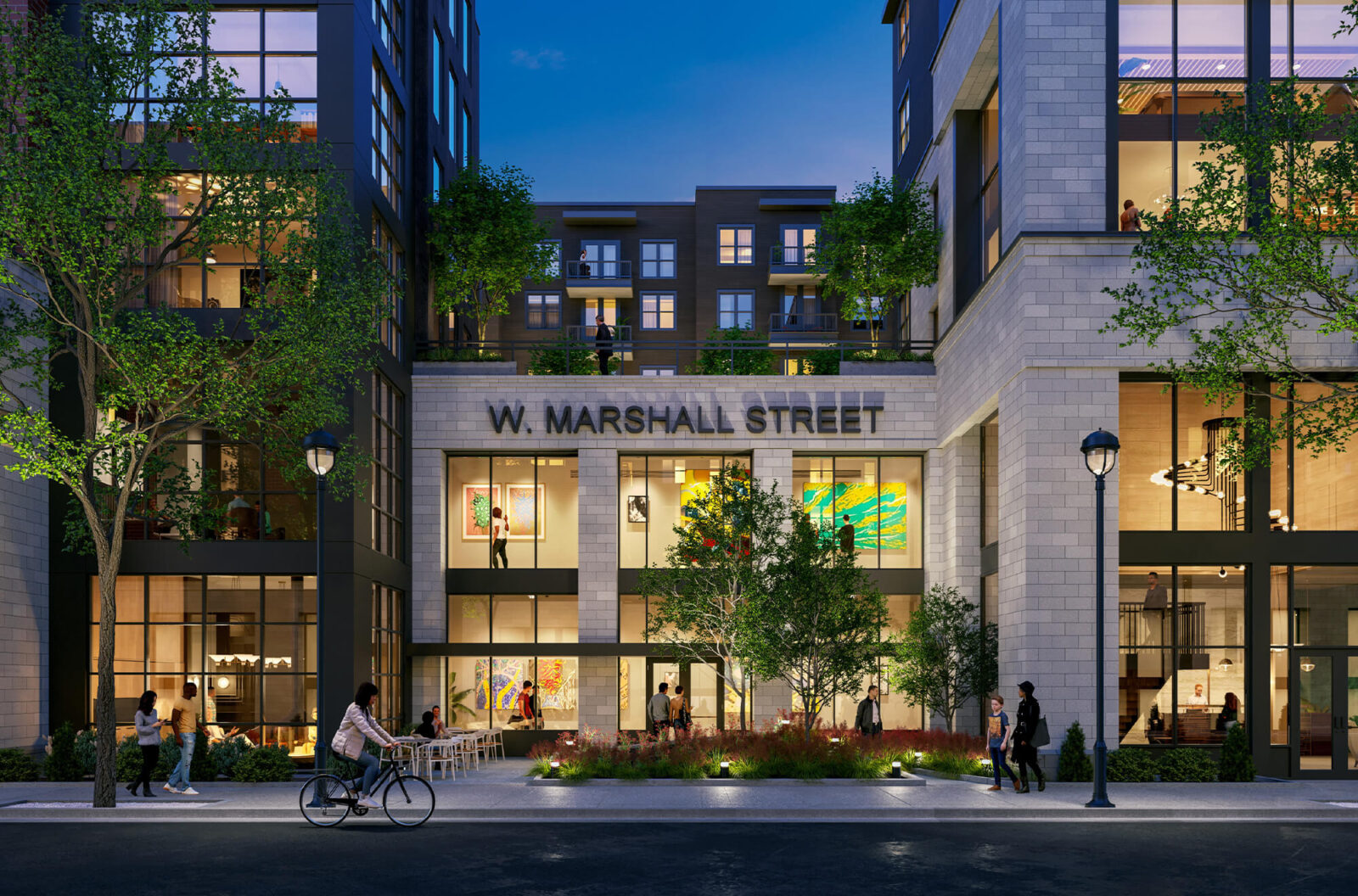 The front of West Marshall with people walking by and walking through the building