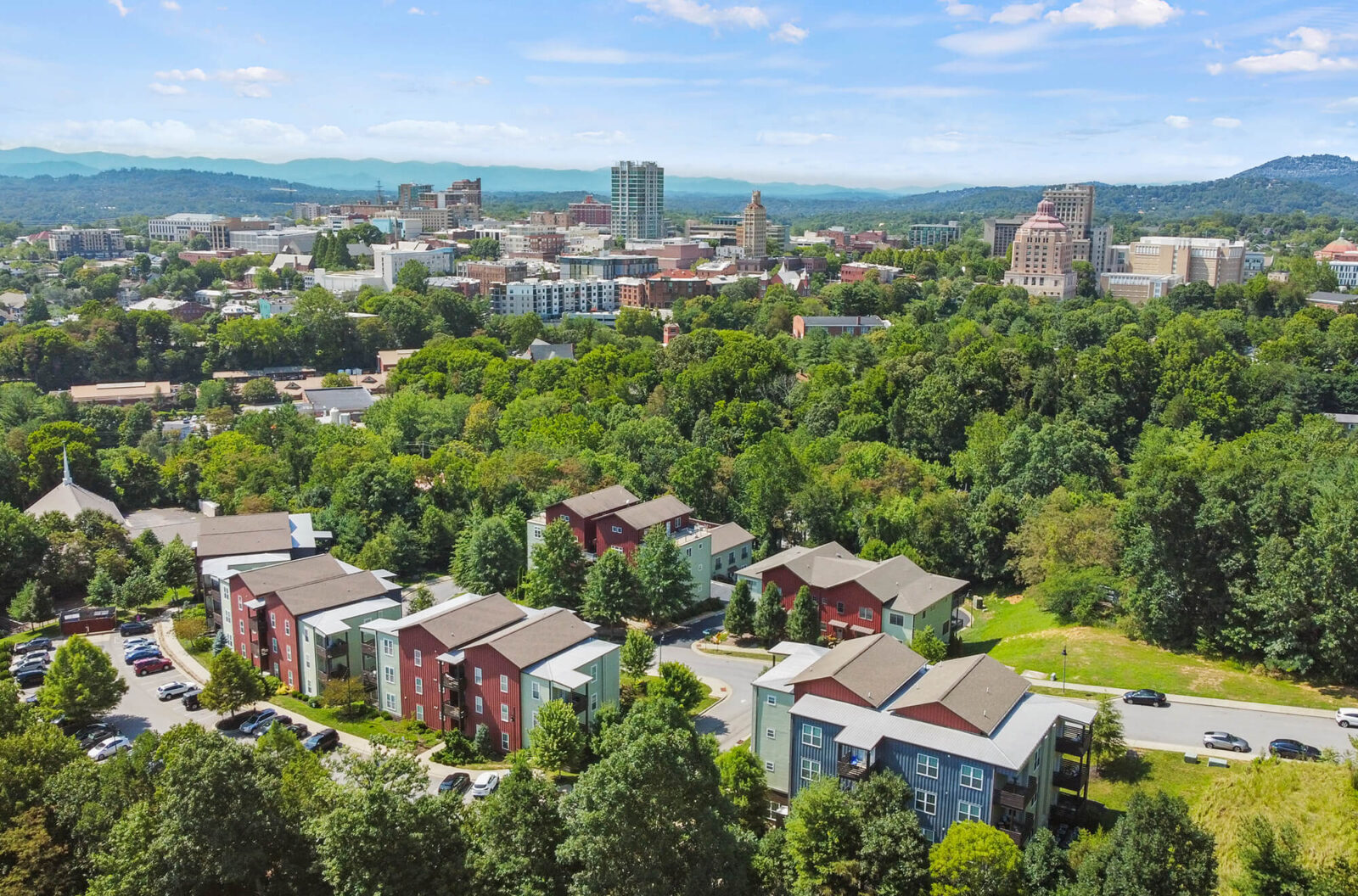 Aerial view of nice apartment complex right outside of the city.